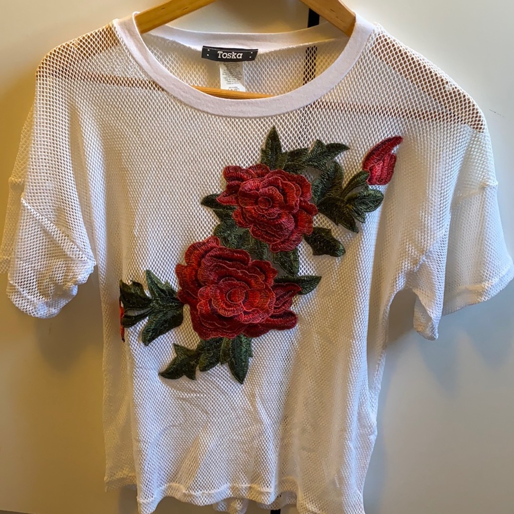 Net cover up top with flower embroidery